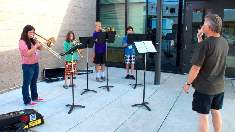 Stan Jeffs coaching a brass quartet